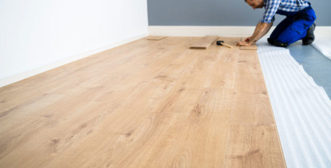 Laminate floor being installed